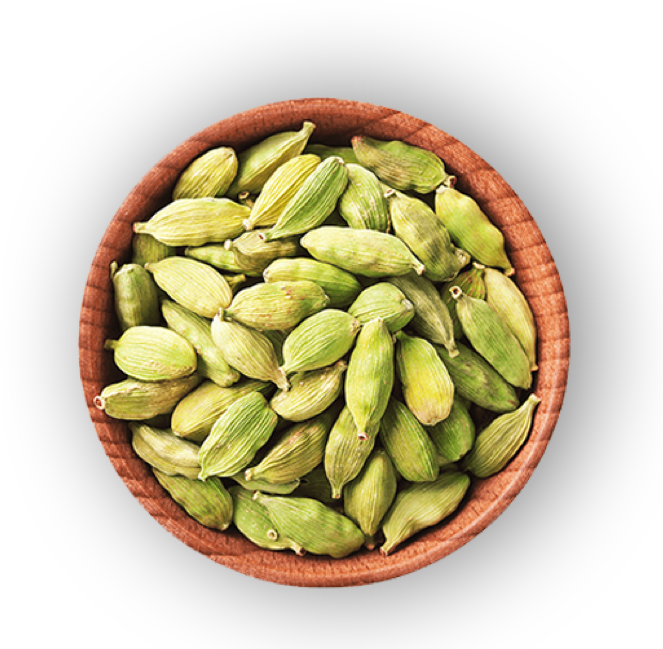 Green cardamom in a wooden bowl